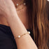 BRACCIALE IN BRONZO DORATO E PERLE NATURALI 2064